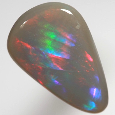 SOLID BLACK OPAL Broad rolling flash of cherry red fire